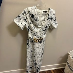 Midi dress, very classic with belt on. Tag still on